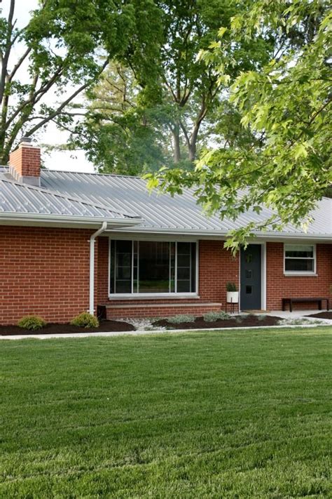 charcoal metal roof on red brick house|red brick house metal roof colors.